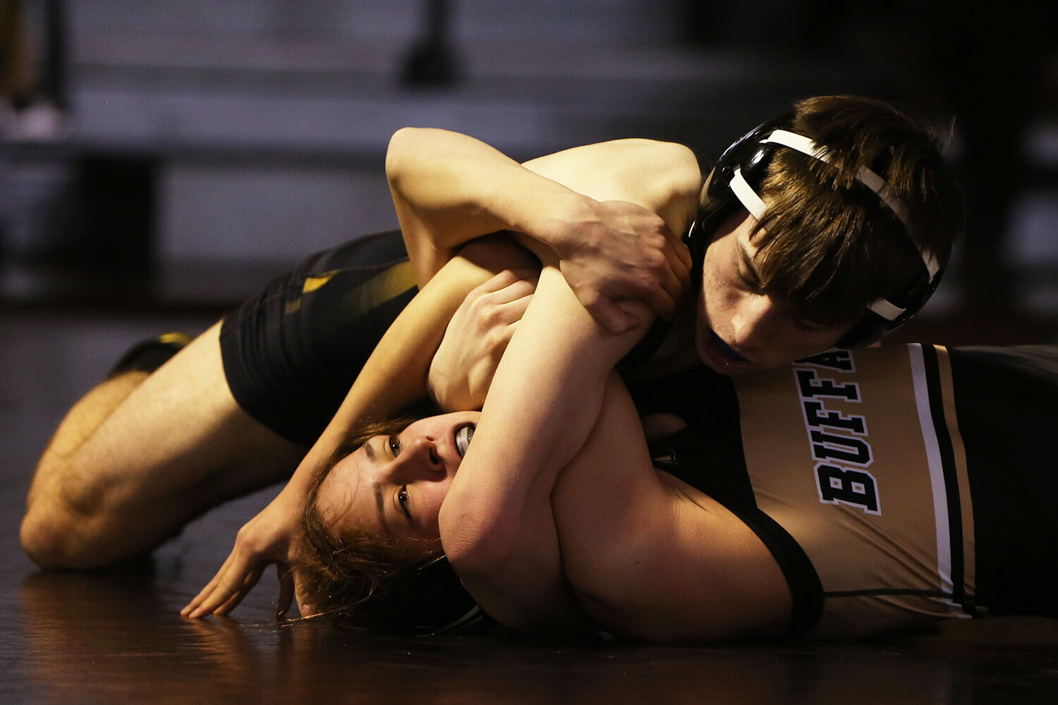 Teila Peters works her way out of a pin by Wright opponent Pace Garrett